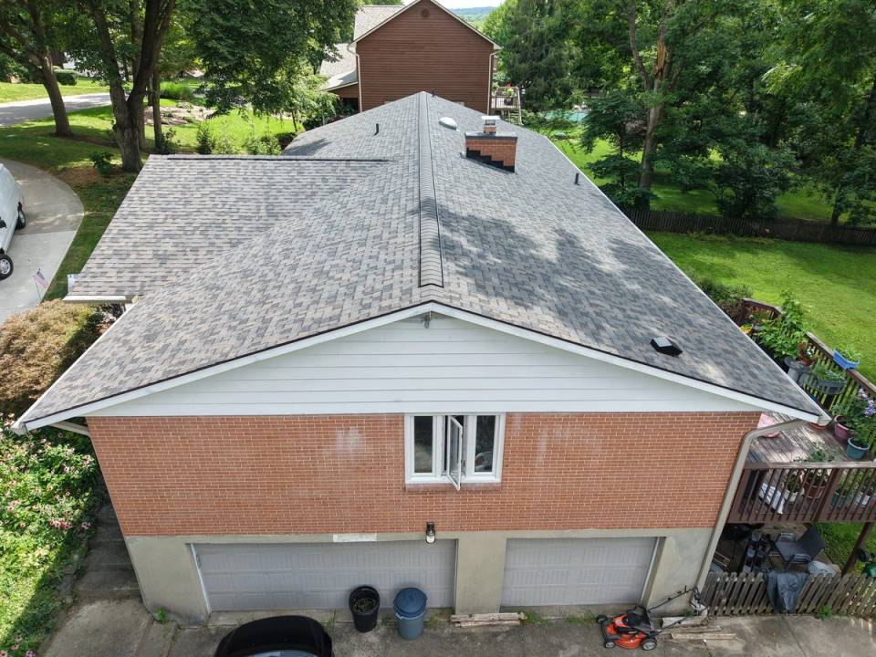 Drone photo of a finished roof on a Beavercreek home.